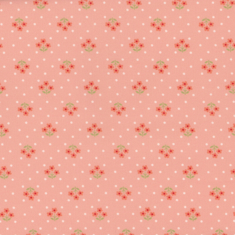 Pale pink fabric, featuring small white polka dots and red flower bundles