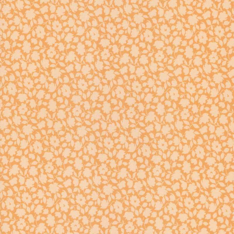 Soft orange fabric, featuring light peach packed together floral silhouettes