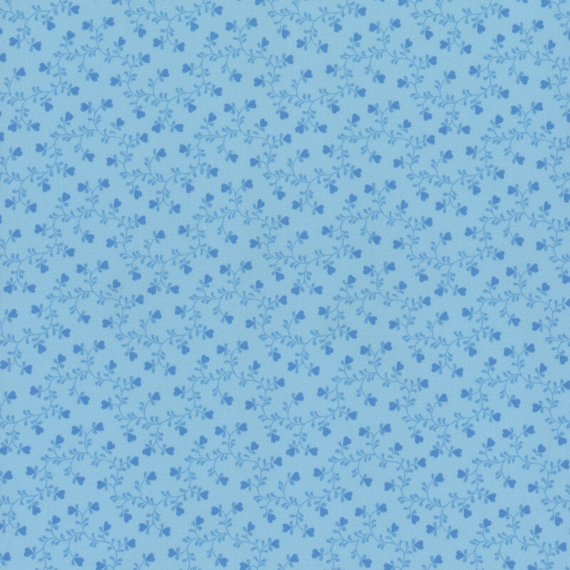 Sky blue fabric, featuring blue winding vines with little blue heart shaped flowers