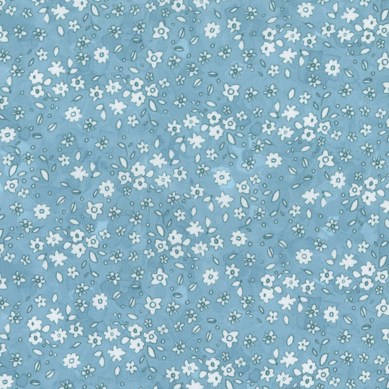 Light aqua fabric with a pattern of little white watercolor flowers.