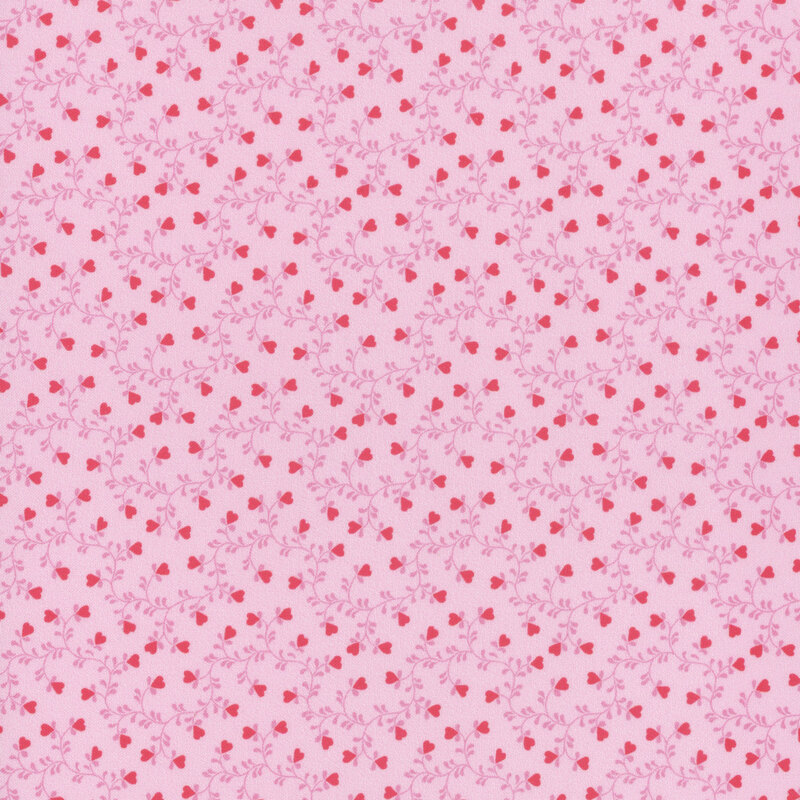 Light pink fabric, featuring pink winding vines with little red heart shaped flowers