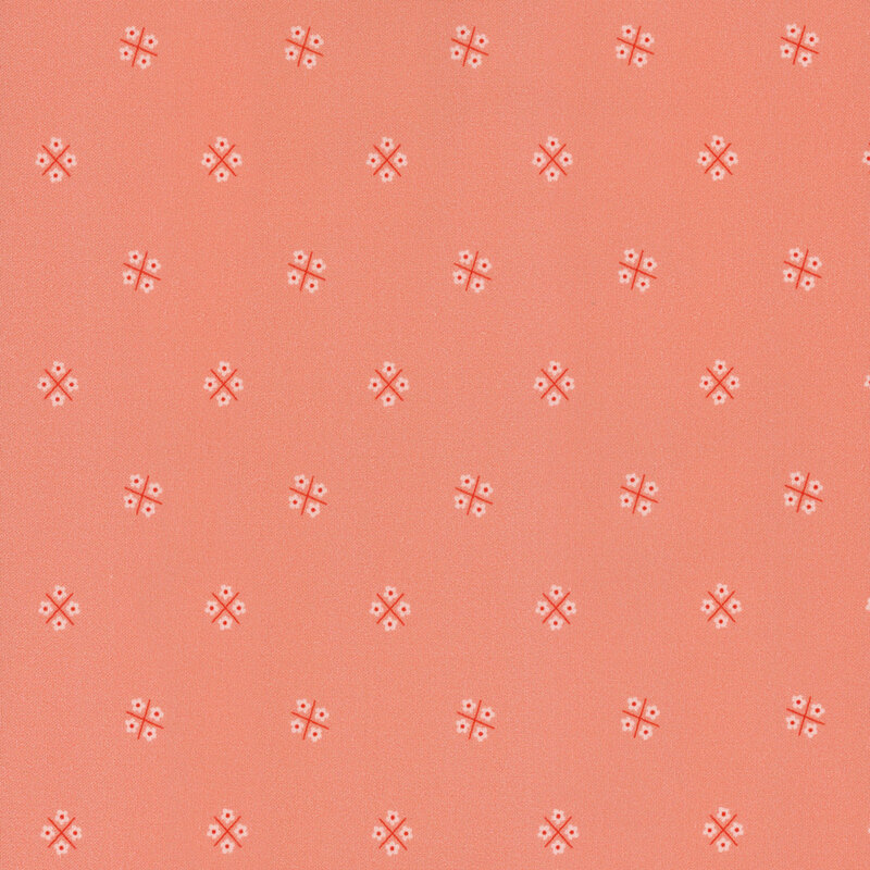 Peach fabric, featuring scattered clusters of flowers