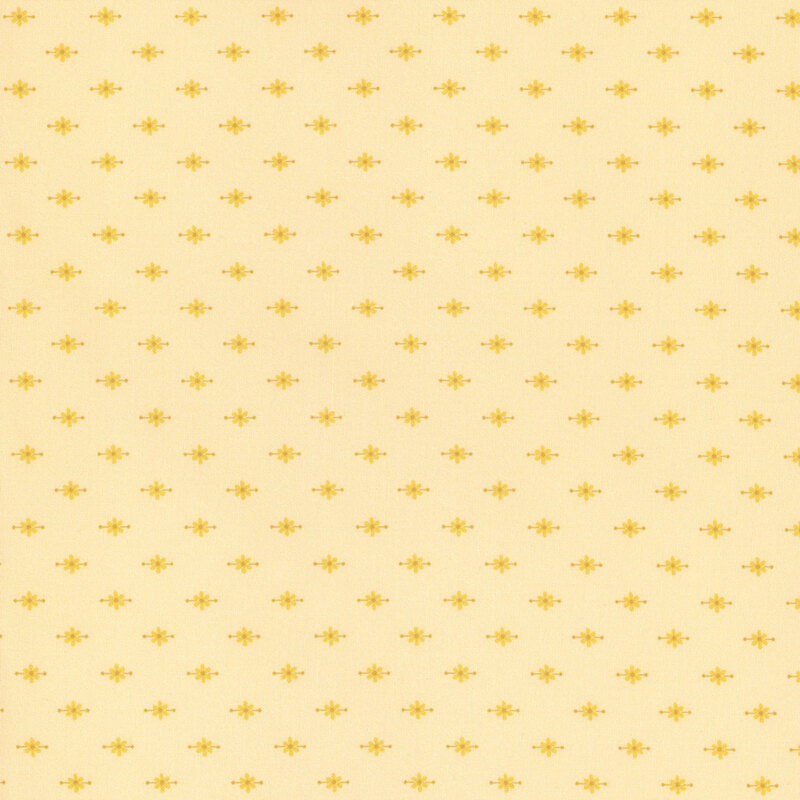 Pale yellow fabric featuring small flower motifs