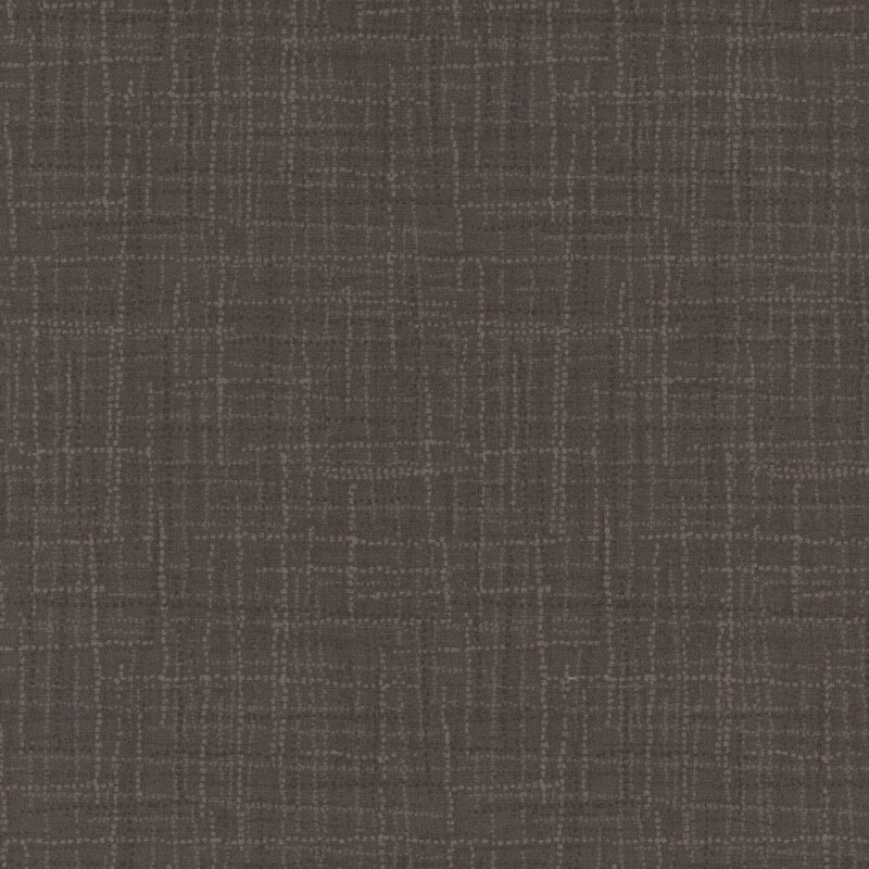 A textured fabric in a dark brown color with subtle lines and patterns.