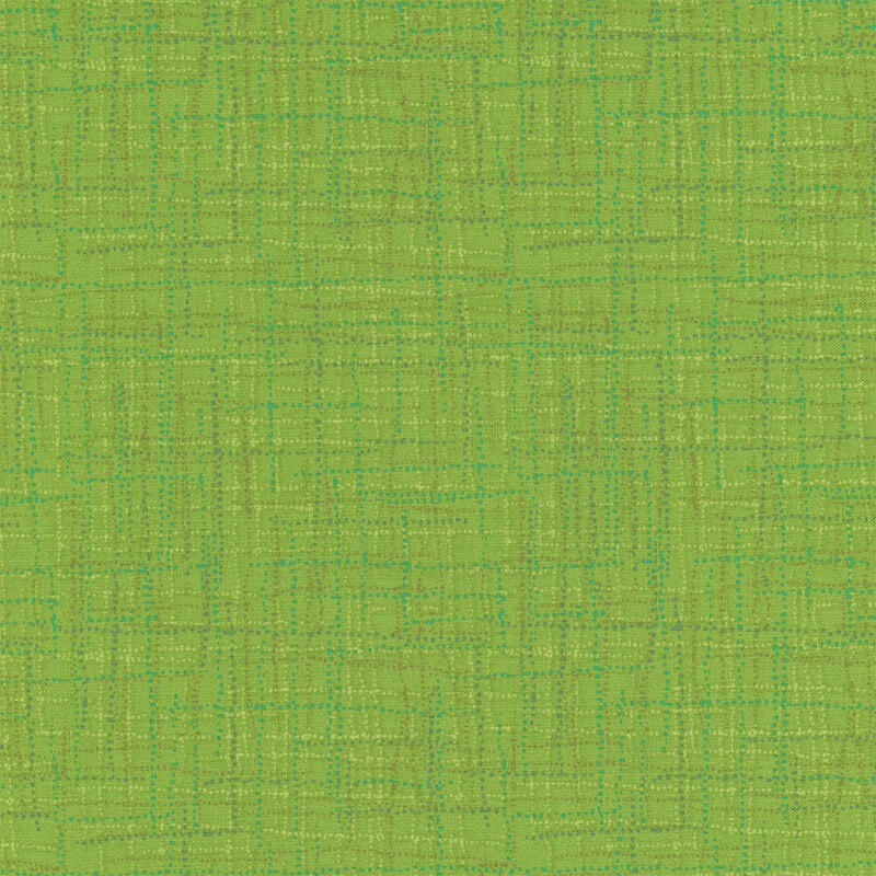 A textured green fabric background with subtle variations in shade and pattern.