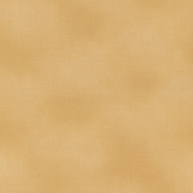 medium tan mottled fabric