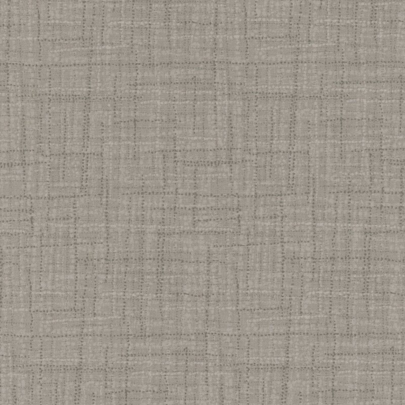 Photo of tonal gray fabric featuring textured lines and dots