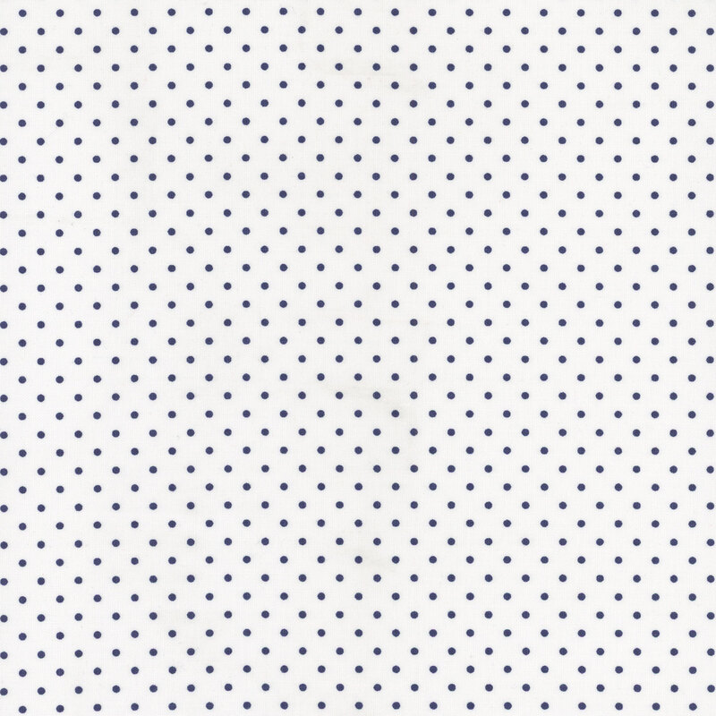 White fabric with navy blue polka dots.