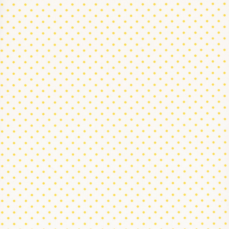 White fabric with sunshine yellow polka dots.