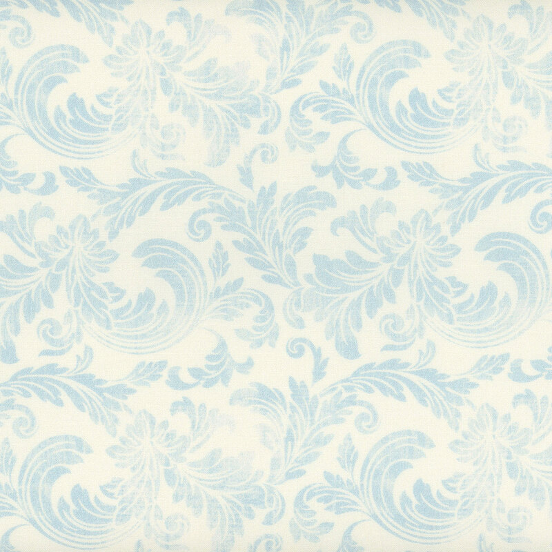 Fabric with a pattern of swirling light blue acanthus leaves on a cream-colored background.