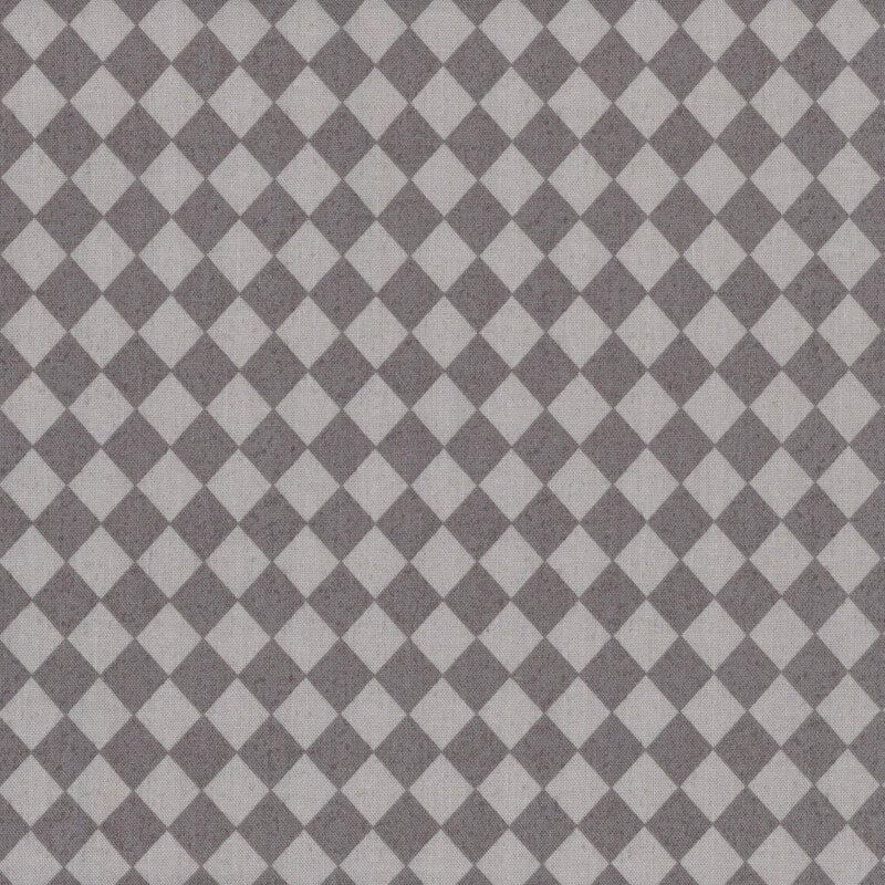 Gray on gray diamond checkered fabric.