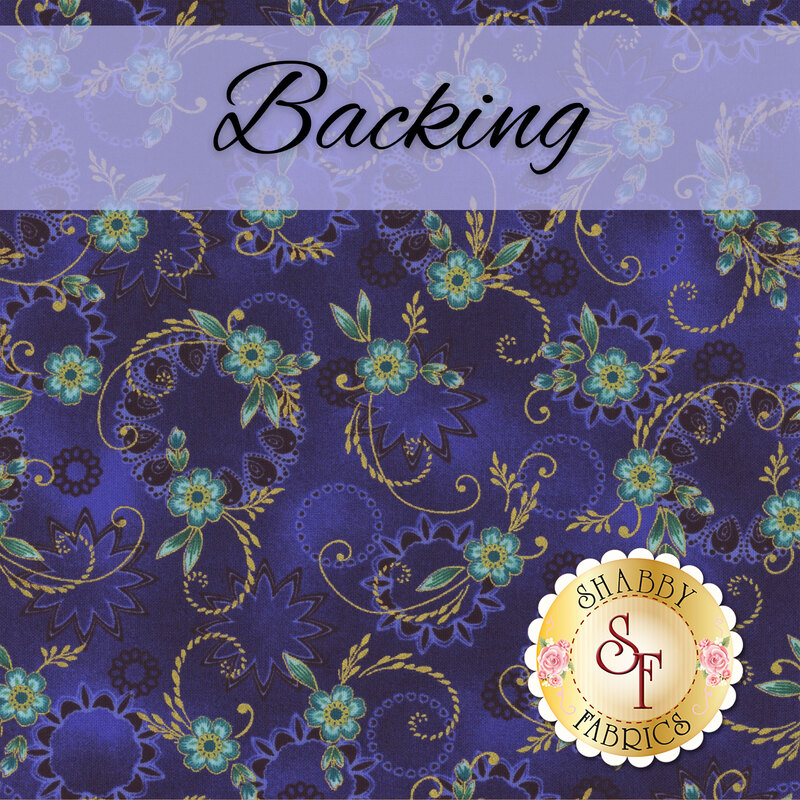 Mottled sapphire blue fabric with tossed teal florals, swirling gold filigree, and ornate patterns. A banner at the top reads 