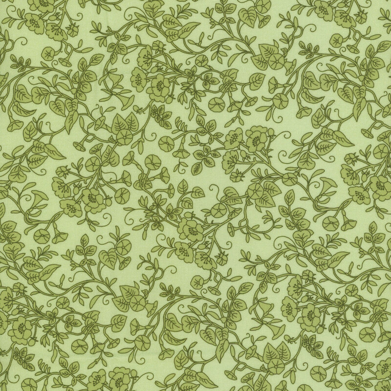 Light green fabric with green vines and flowers.