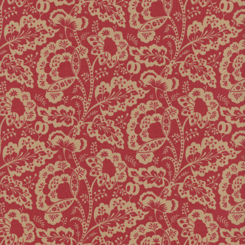 red fabric featuring a intricate floral design