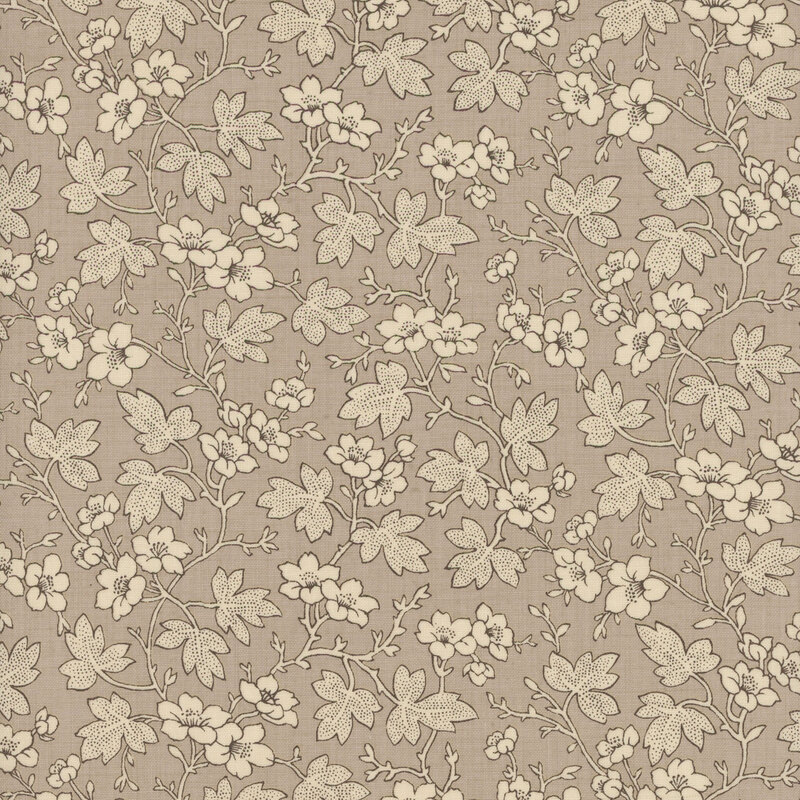 Gray fabric featuring cream leaves and flowers 