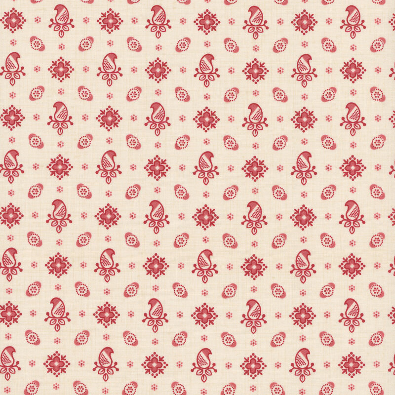 Cream fabric featuring a pattern of paisleys and florals