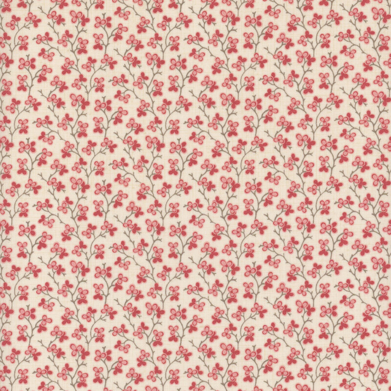 cream fabric featuring a pink floral design