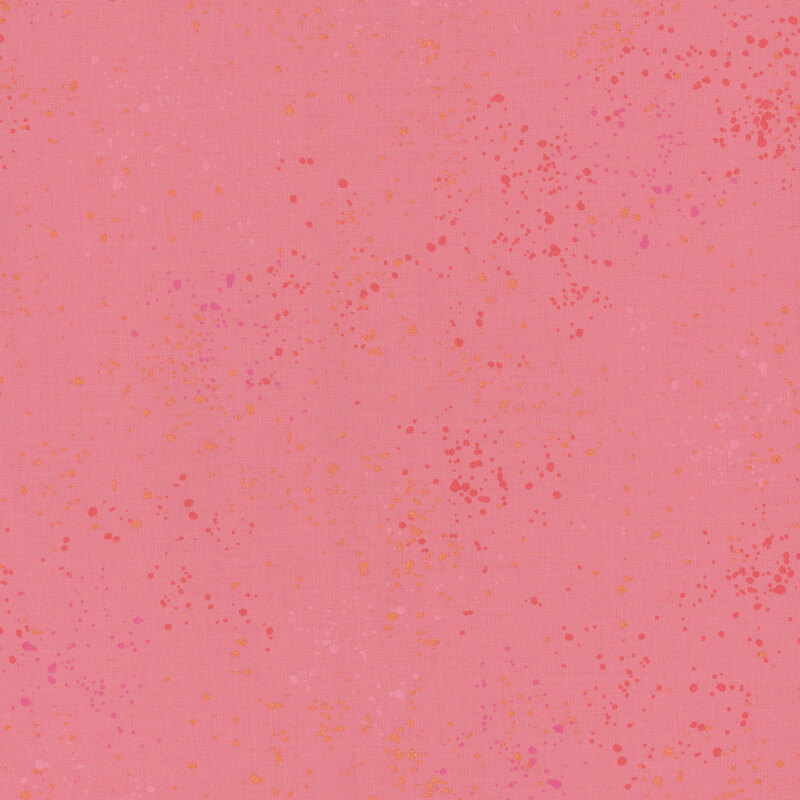 Bright pink fabric featuring varying shades of pink and gold metallic speckles throughout