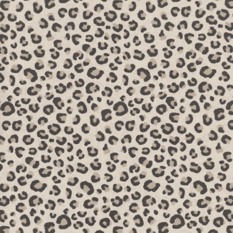 Black and brown leopard spots on a cream background.