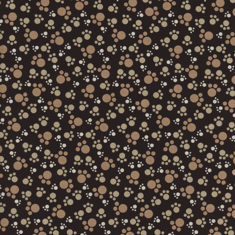 Beige and brown paw prints on a black background.