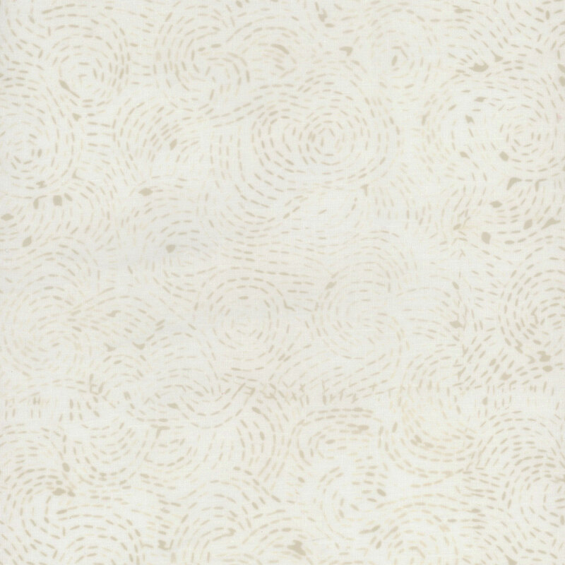 Cream fabric with a lovely swirled and dotted design