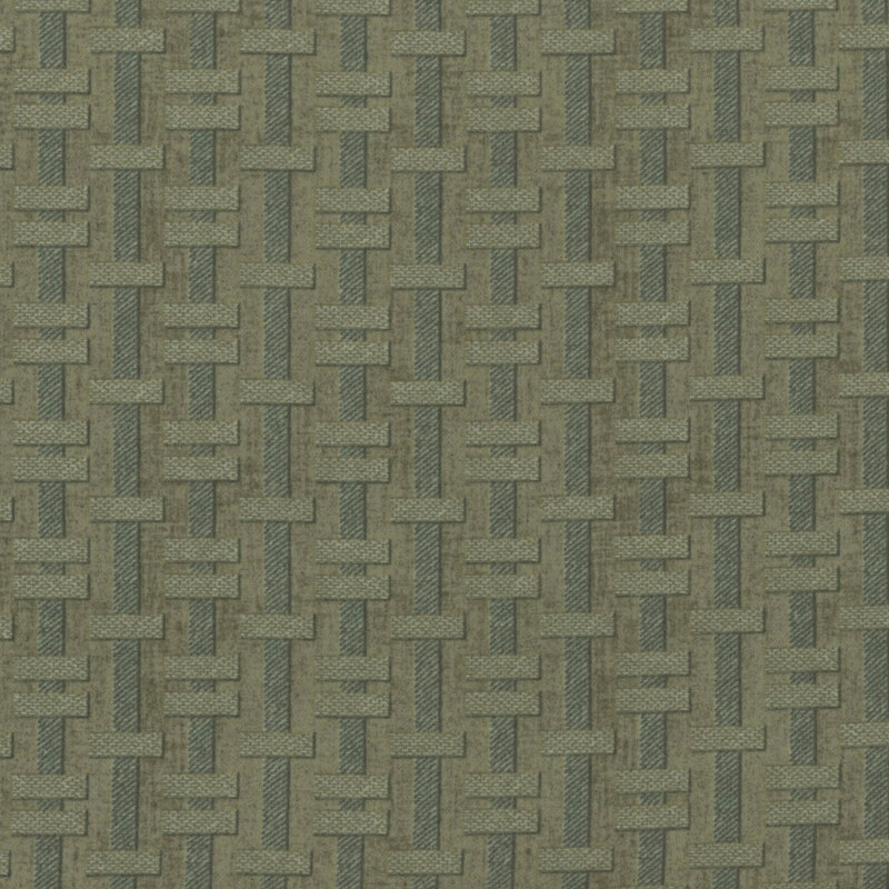 green fabric featuring a striped design of rectangular blocks