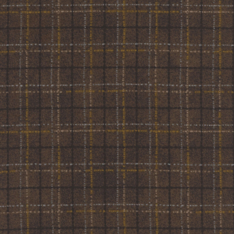 brown fabric featuring a dotted plaid design