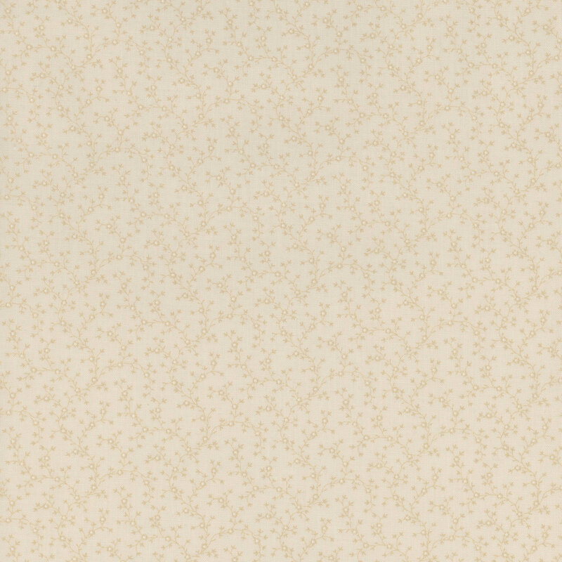 Light tan tonal fabric covered in small florals and vines