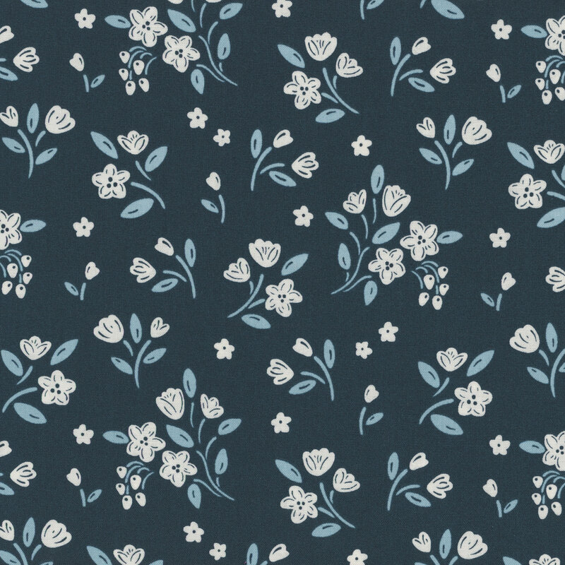 Navy blue fabric with ditsy floral bunches featuring light blue stems and white flowers