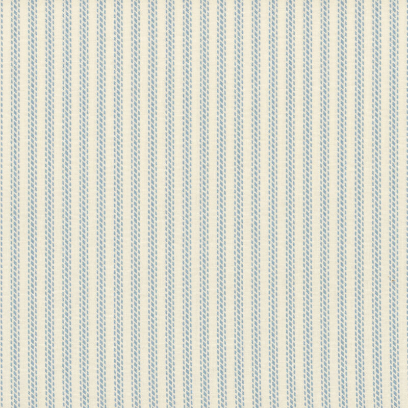 Light cream fabric with pale blue geometric stripes