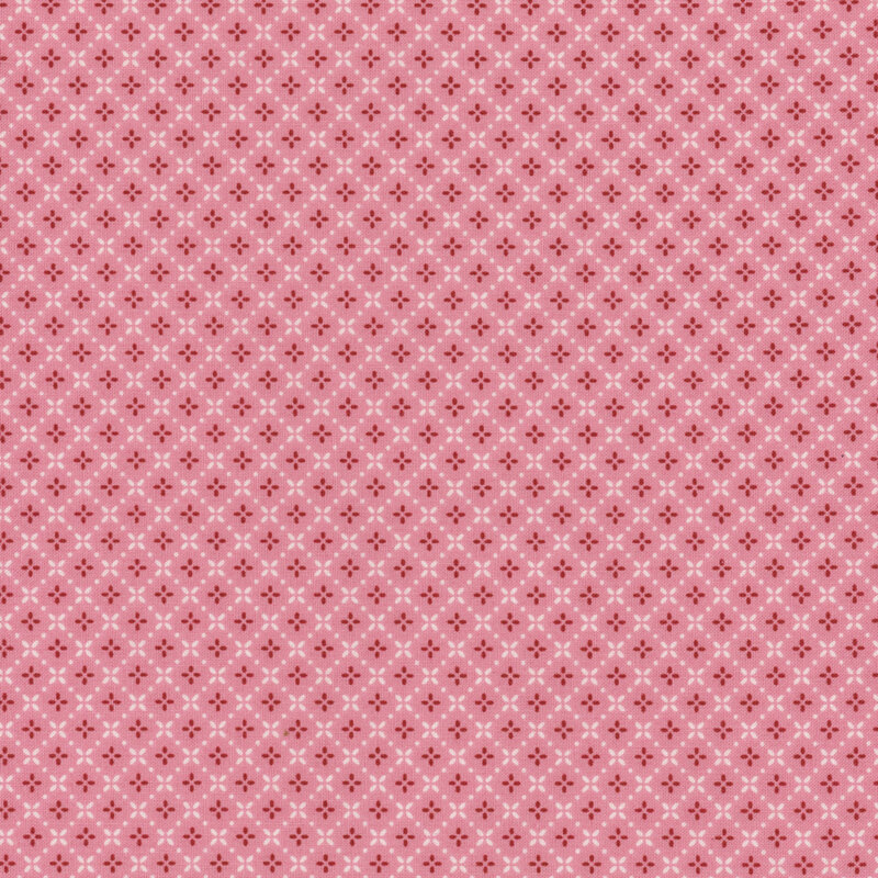 Light pink fabric with small dotted diamond patterns throughout