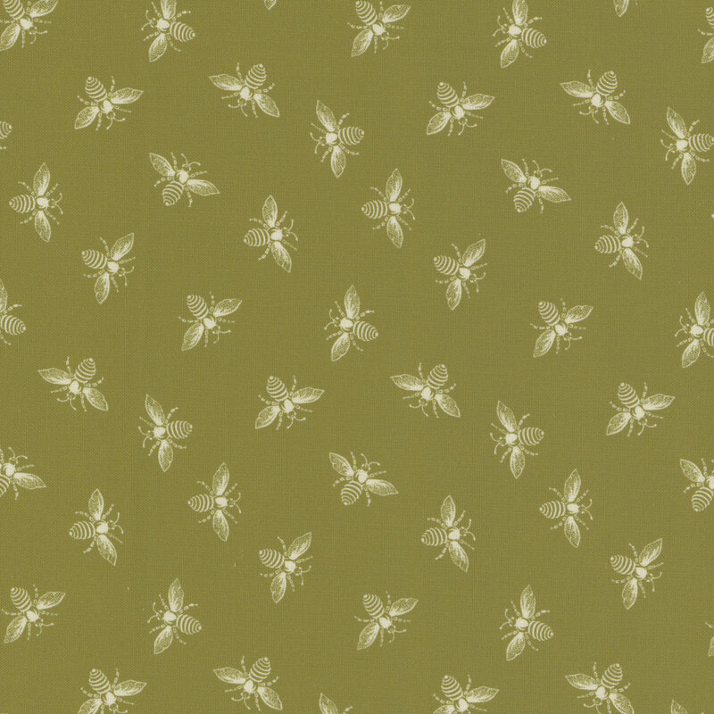 Grass green fabric with off-white ditsy bees all over.