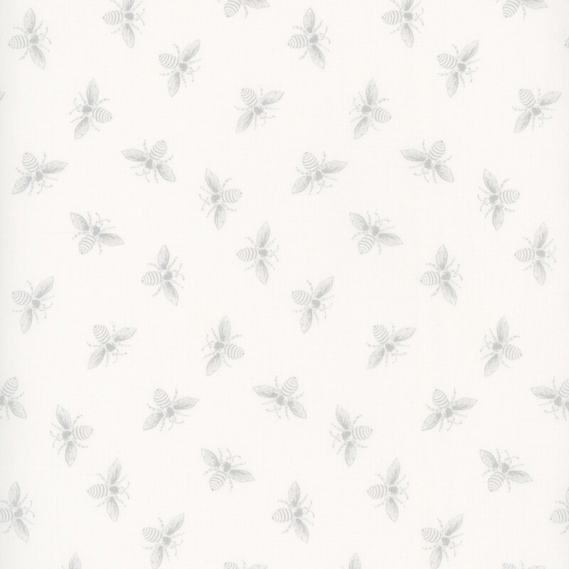 Off white fabric with light gray ditsy bees all over