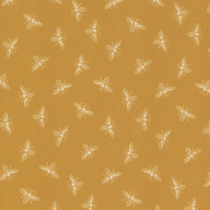 Butterscotch yellow fabric with off white ditsy bees all over