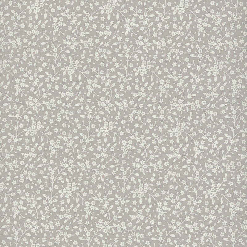 Light gray fabric with off white leaves and vines all over