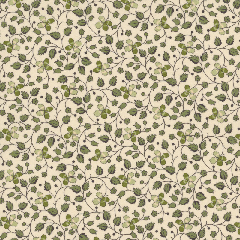 Cream fabric with creeping green vines, leaves, and clovers throughout.