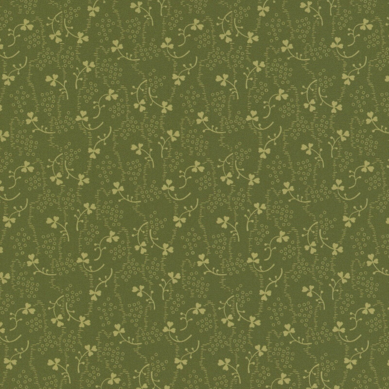 Forest green fabric with small, light green shamrocks and vines all over.