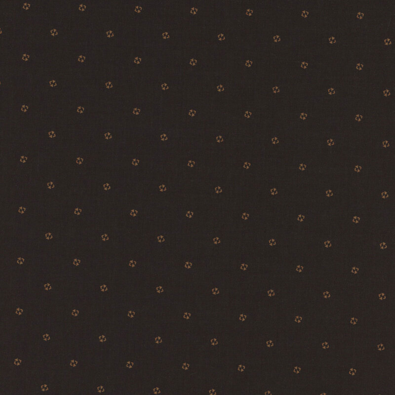 Black fabric with tiny, evenly spaced brown decorations