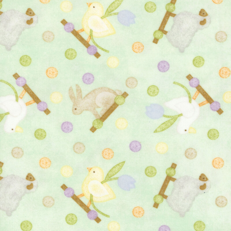 soft pastel green fabric featuring chicks, ducks, bunnies, and sheep with multicolored dots.