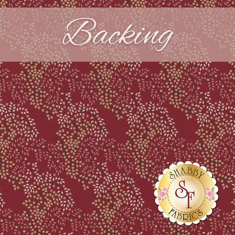 A swatch of crimson fabric with a repeating motif of tiny leaves in tonal red, sandy brown, and sandy white. A dusty pink banner at the top reads 