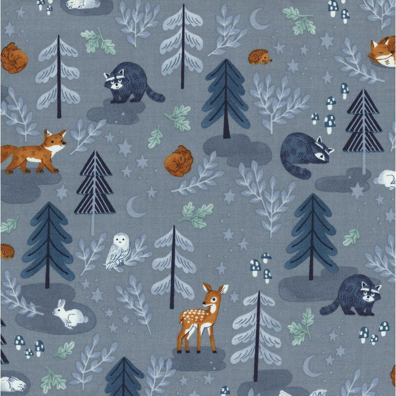 blue fabric featuring a forest with wildlife animals