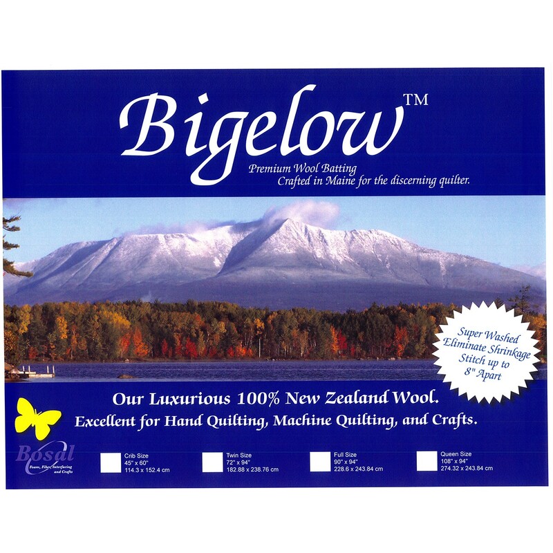 Product packaging for Bigelow premium wool batting, featuring snowy mountains and details about its use in quilting.