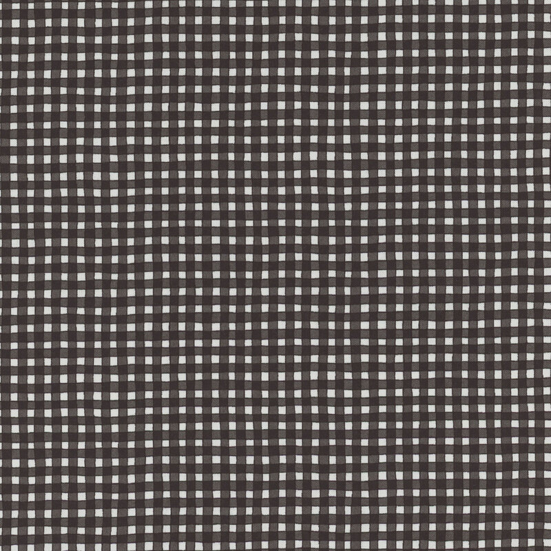 Black and white fabric with small, chunky checkered print