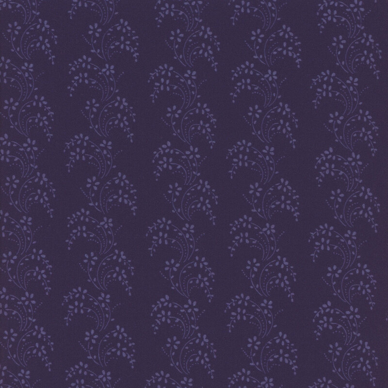 Navy blue fabric with columns of light blue wavy leaves and vines