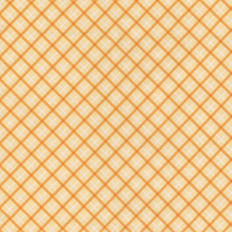 Yellow and white diagonal plaid fabric