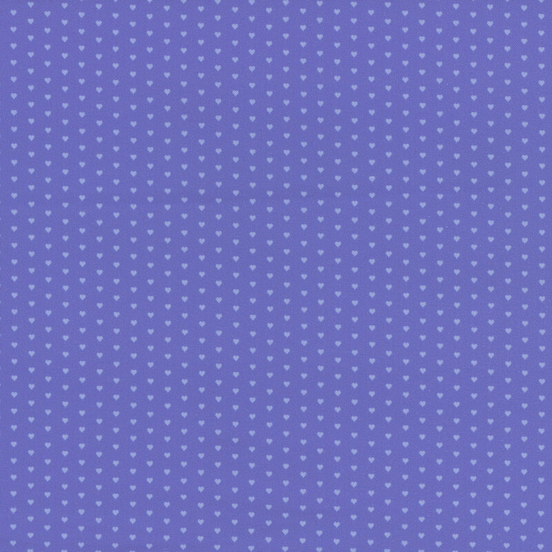 Periwinkle fabric with a pattern of mini light blue hearts