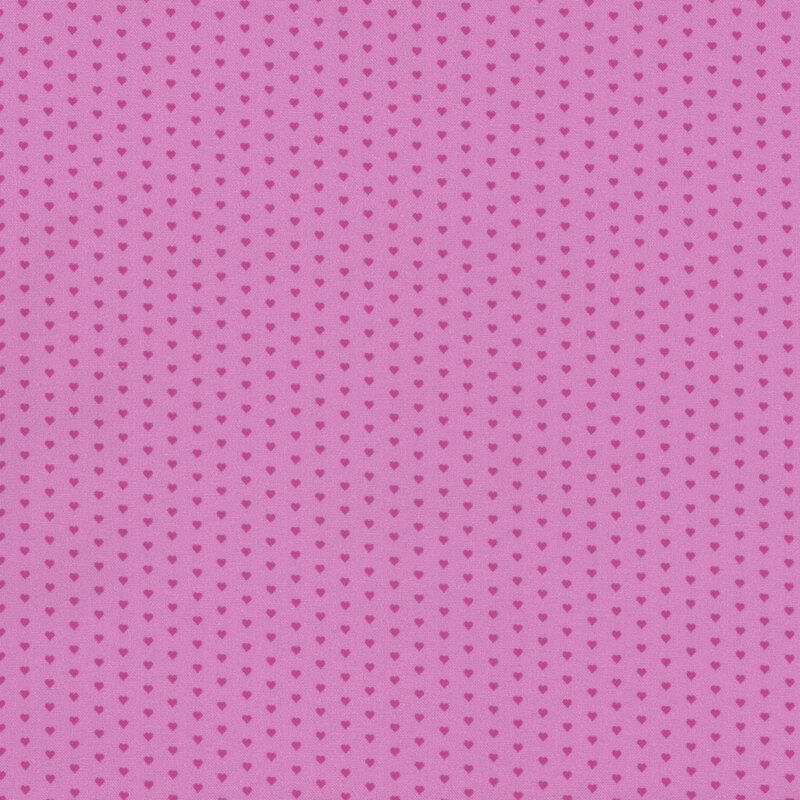 Light pink fabric with a pattern of mini dark pink hearts