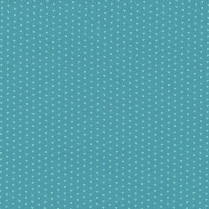 Aqua fabric with a pattern of mini mint green hearts