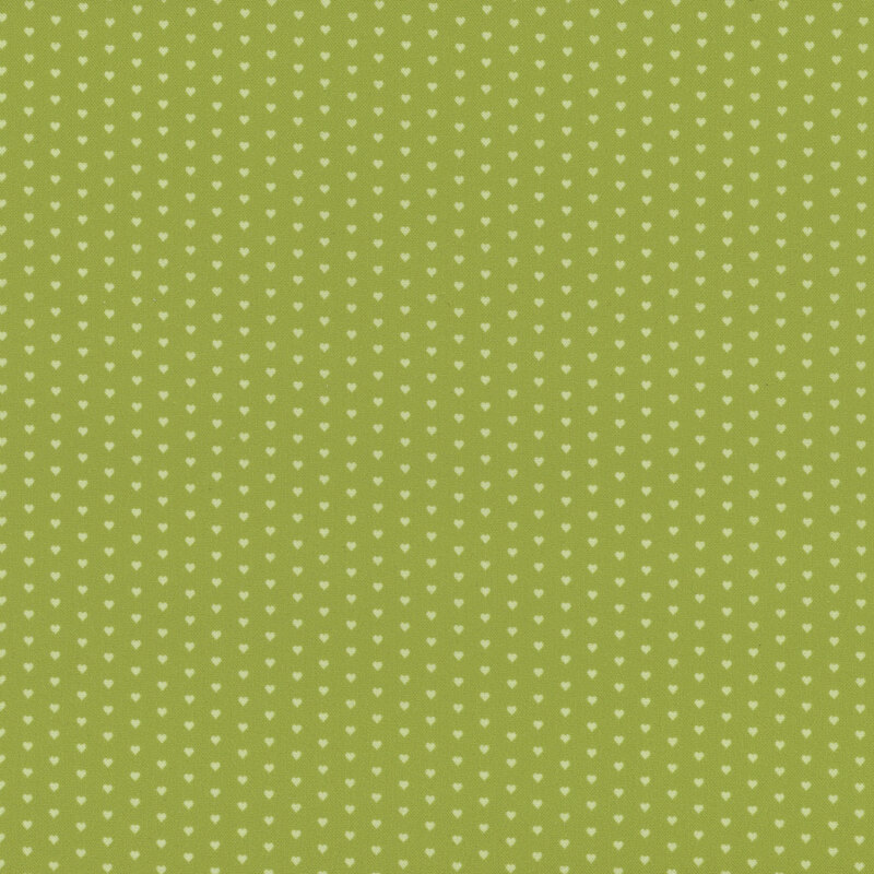 Apple green fabric with a pattern of mini light green hearts