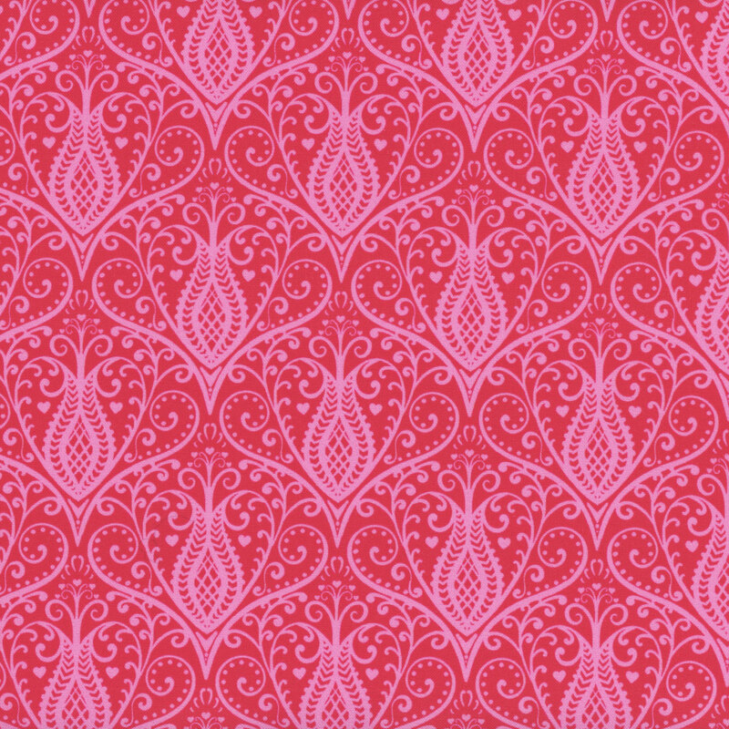 Red fabric with damask like repeating pink swirled floral designs